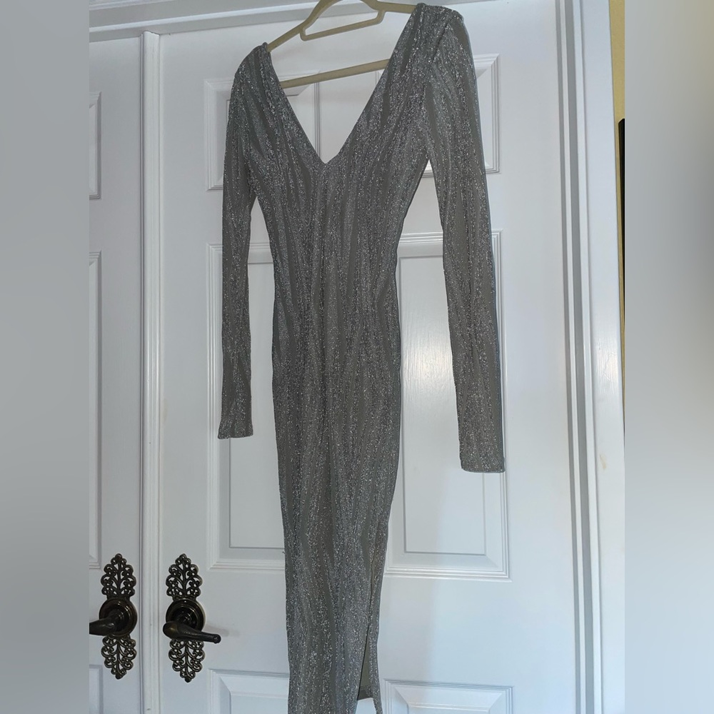 Long Sleeve Silver/Sparkly Dress / Has A Slit & Lining On Inside / Size: Medium